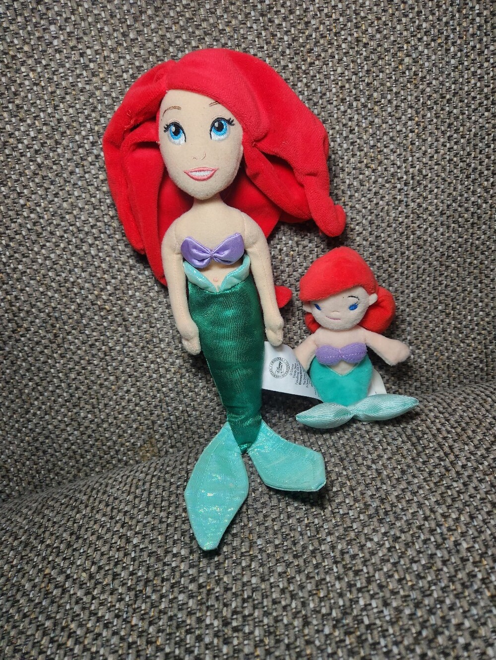 two Disney Store Ariel plush dolls from The Little Mermaid